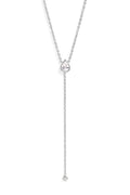 A delicate silver Y-necklace featuring a small heart-shaped crystal pendant and a long drop chain ending in a single clear crystal bead, shown against a solid white background.
