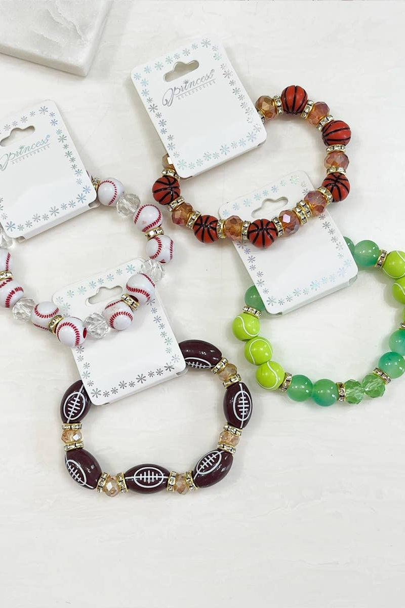 Set of colorful beaded bracelets on white background