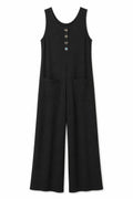 A black sleeveless wide-leg jumpsuit with a buttoned henley-style neckline and two front patch pockets, shown flat against a white background.