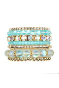 Set of colorful beaded bracelets on a white background