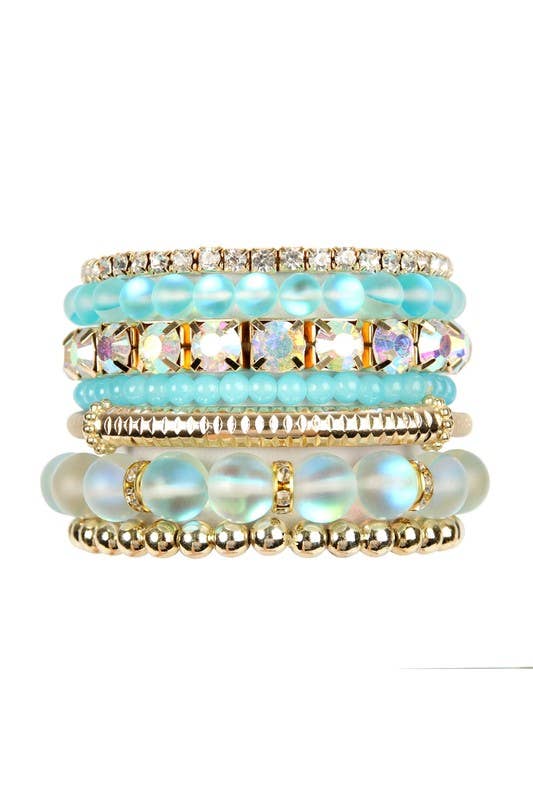 Set of colorful beaded bracelets on a white background